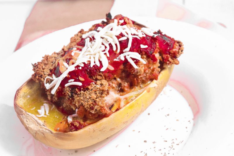 Cut your carbohydrate intake by nearly 75% when you enjoy tender breaded chicken with all-natural, homemade whole wheat breadcrumbs baked into a nutrient dense, spaghetti squash bowl to make the most nutritious & delicious Spaghetti Squash Chicken Parmesan.