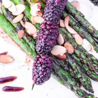 Wake up your taste buds and celebrate the return of spring with this fresh and delicious Balsamic Grilled Asparagus & Blackberries with Almonds dish!