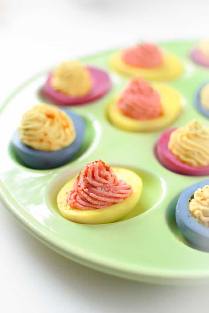 These beautiful Naturally Dyed Deviled Eggs are the perfect pretty appetizer for any holiday plus an excellent source of protein. Whether food dye allergies or intolerance are present in your family or not, everyone can benefit from making the switch to these all natural food dyes!
