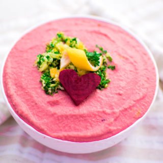 Wow everyone at your next party or get together with this beautiful Pink Gremolata #Hummus! Made with white beans and beets, this beautiful dish is 100% plant-based with no artificial colors or ingredients. This is the perfect dip for pair with your favorite veggie or whole grain crackers, and can be the perfect accompaniment to any sandwich or wrap! | @EmKyleNutrition