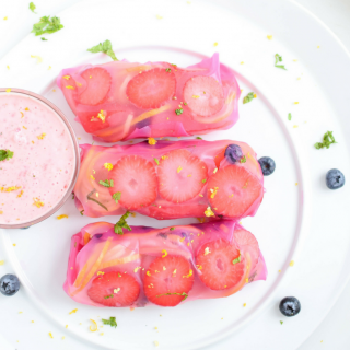 A unique twist on the classic spring roll, these Pink Fresh Fruit Spring Rolls paired with a Strawberry Mint Dip are a sweet treat that is naturally dyed, with no added sugar, naturally vegan and gluten-free!