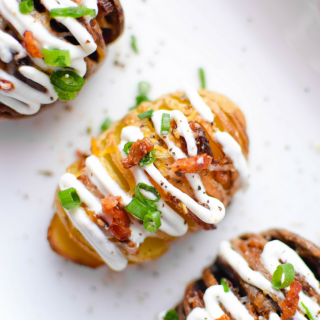 These Lightly Loaded Purple Hasselback Potatoes are a delicious appetizer for any occasion, made with wholesome ingredients that make this recipe naturally gluten free and packed with antioxidants, dietary fiber, and of course, flavor.