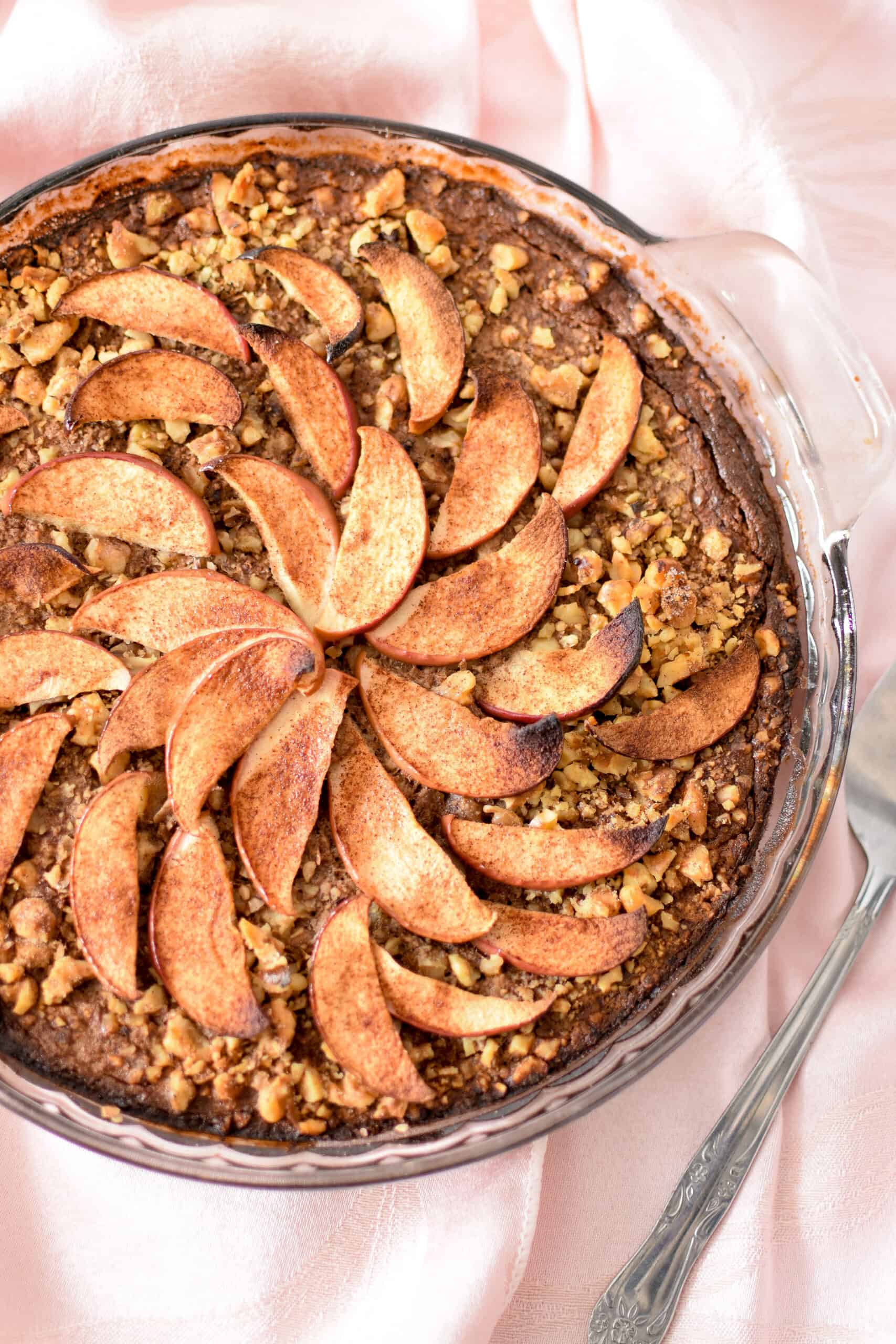 Spice up your breakfast routine with this simple. whole-food, nutrient dense Apple & Cinnamon Baked Oatmeal Cake!