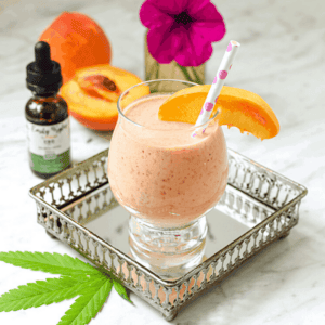 A picture of a raspberry peach cannabis smoothie.