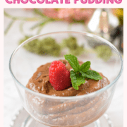 A picture of a clear trifle glass full of cannabis raspberry chocolate pudding.