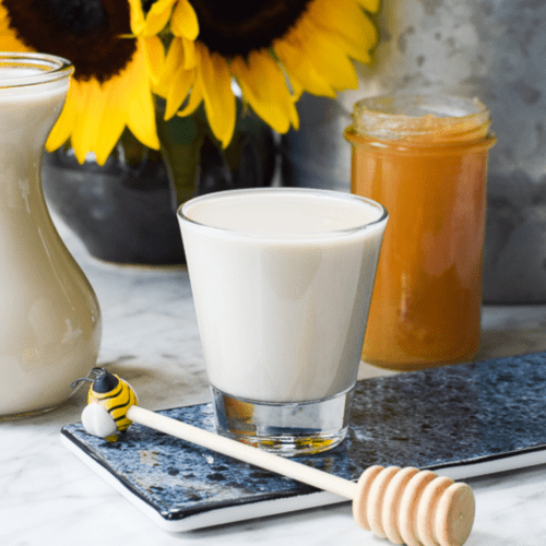 A picture of a glass of homemade sunflower seed milk.