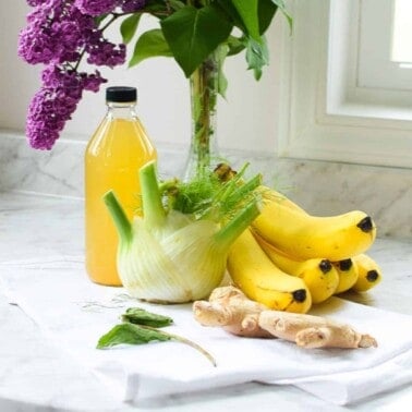 A picture of all of the natural remedies to cure a stomachache including bananas, fennel, and apple cider vinegar.