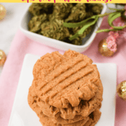 A white plate with a stack of cannabis peanut butter cookies