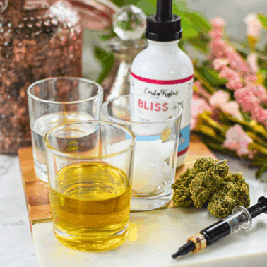 A picture of several different types of cannabis oil.