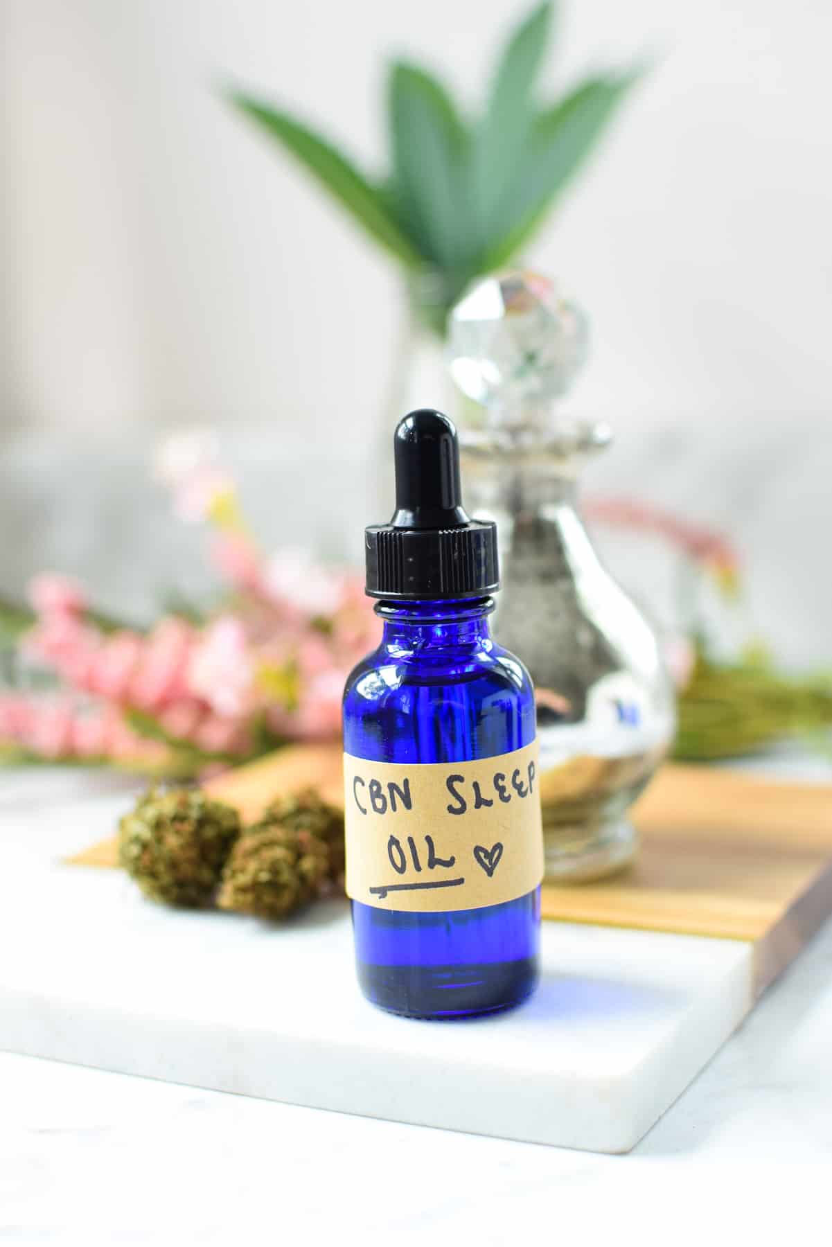 A finished blue bottle of homemade CBN Sleep Oil