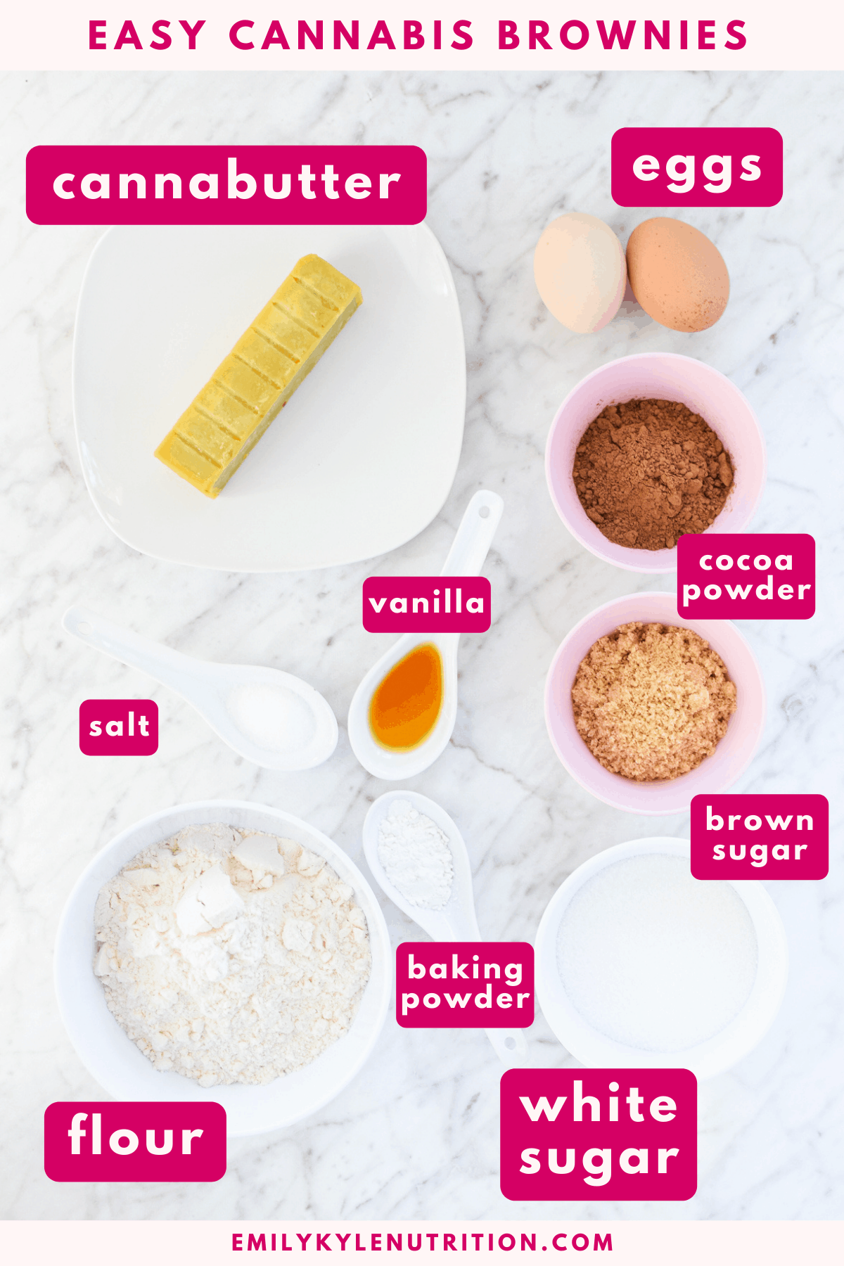 A white counter top with all of the ingredients needed to make brownies, labeled in pink, including cannabutter, eggs, cocoa powder, brown sugar, white sugar, flour, baking soda, vanilla and salt
