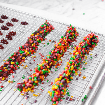Three cannabis nerds ropes resting on a metal baking rack