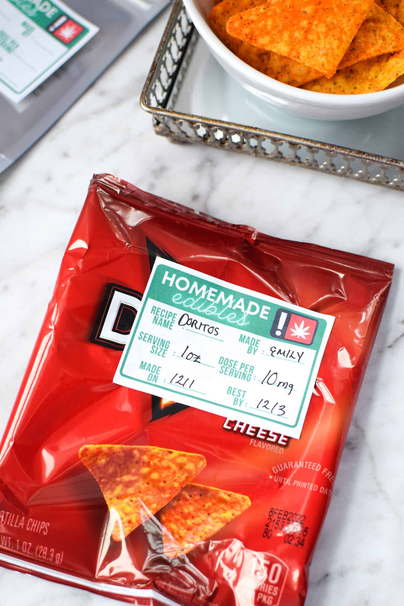A bag of Doritos with an edible label sticker.