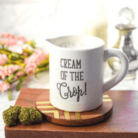 A picture of a cream container containing cannabis coffee creamer.