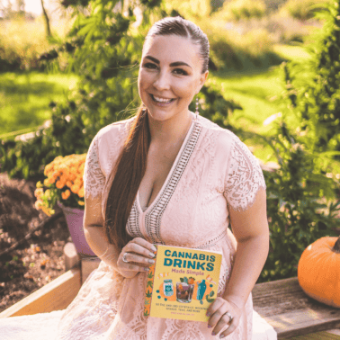 A picture of Emily Kyle holding a cannabis drink book