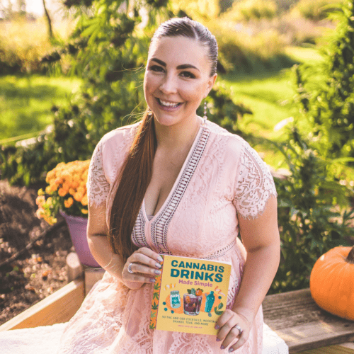A picture of Emily Kyle holding a cannabis drink book