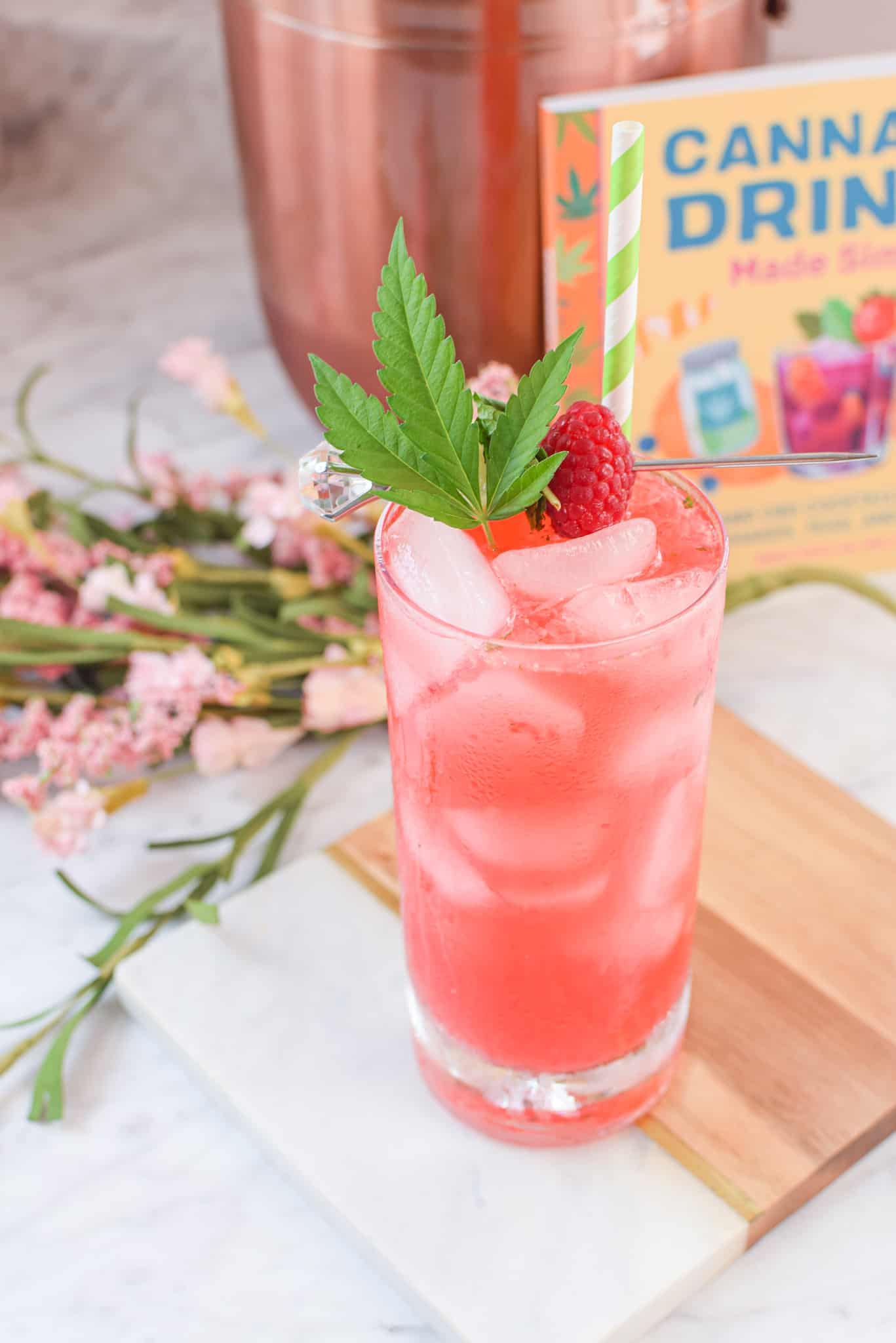 A picture of a raspberry cannabis mojito.