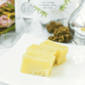 A picture of CBD butter or CBD cannabutter on a white plate.