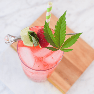 A picture of a raspberry cannabis mojito.