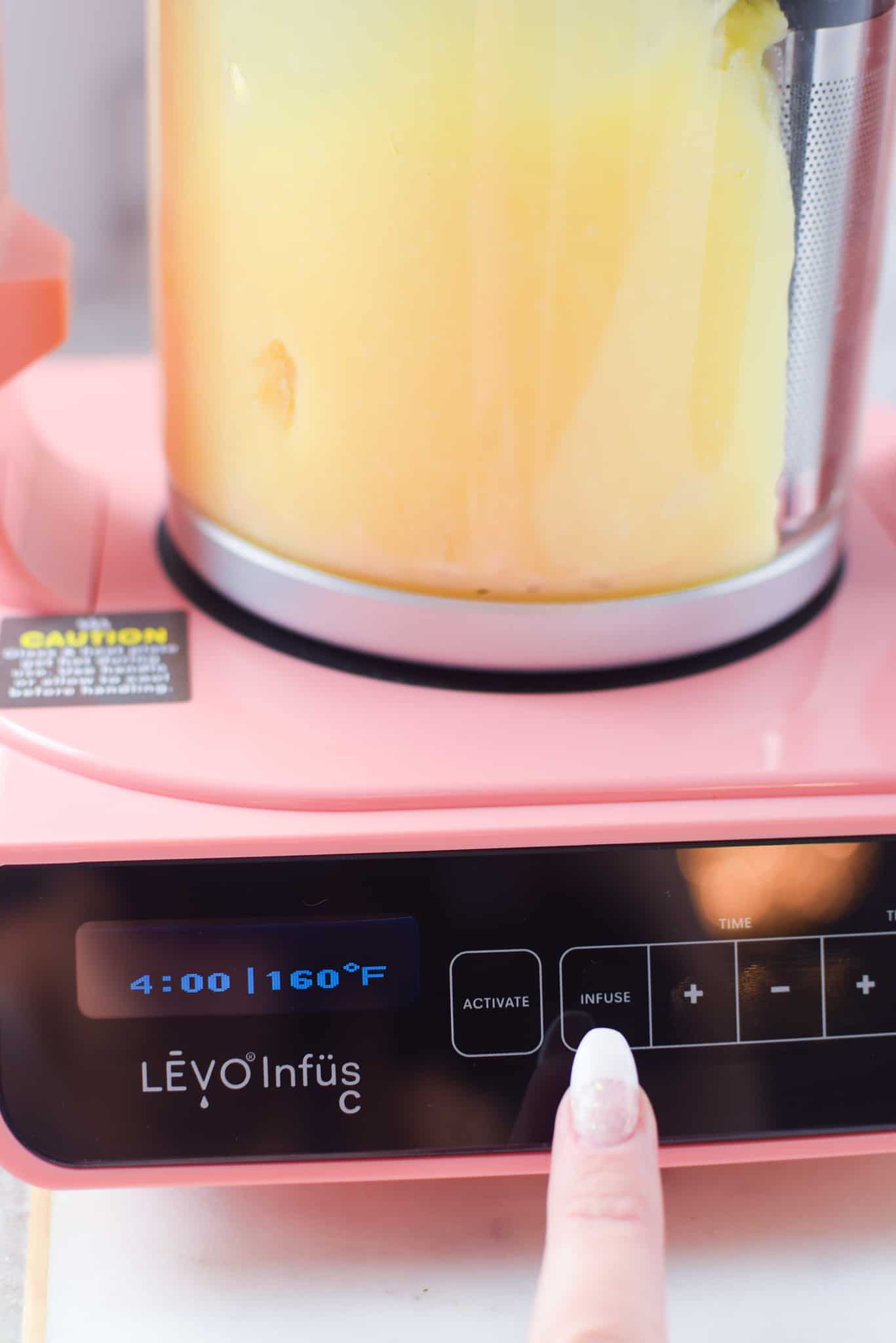A picture of cannabutter being made with the levo machine. 