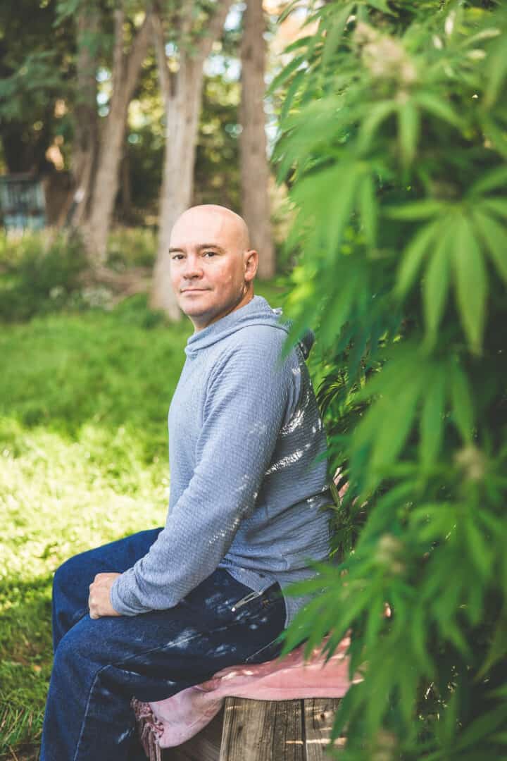 A picture of Phil Kyle in the cannabis garden.
