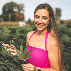 A picture of Emily Kyle growing cannabis plants.