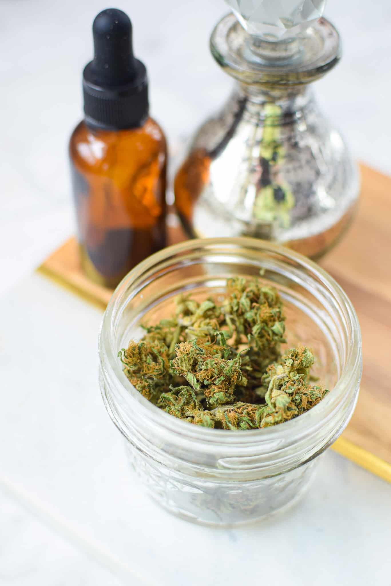 A picture of dried cannabis in a mason jar. 