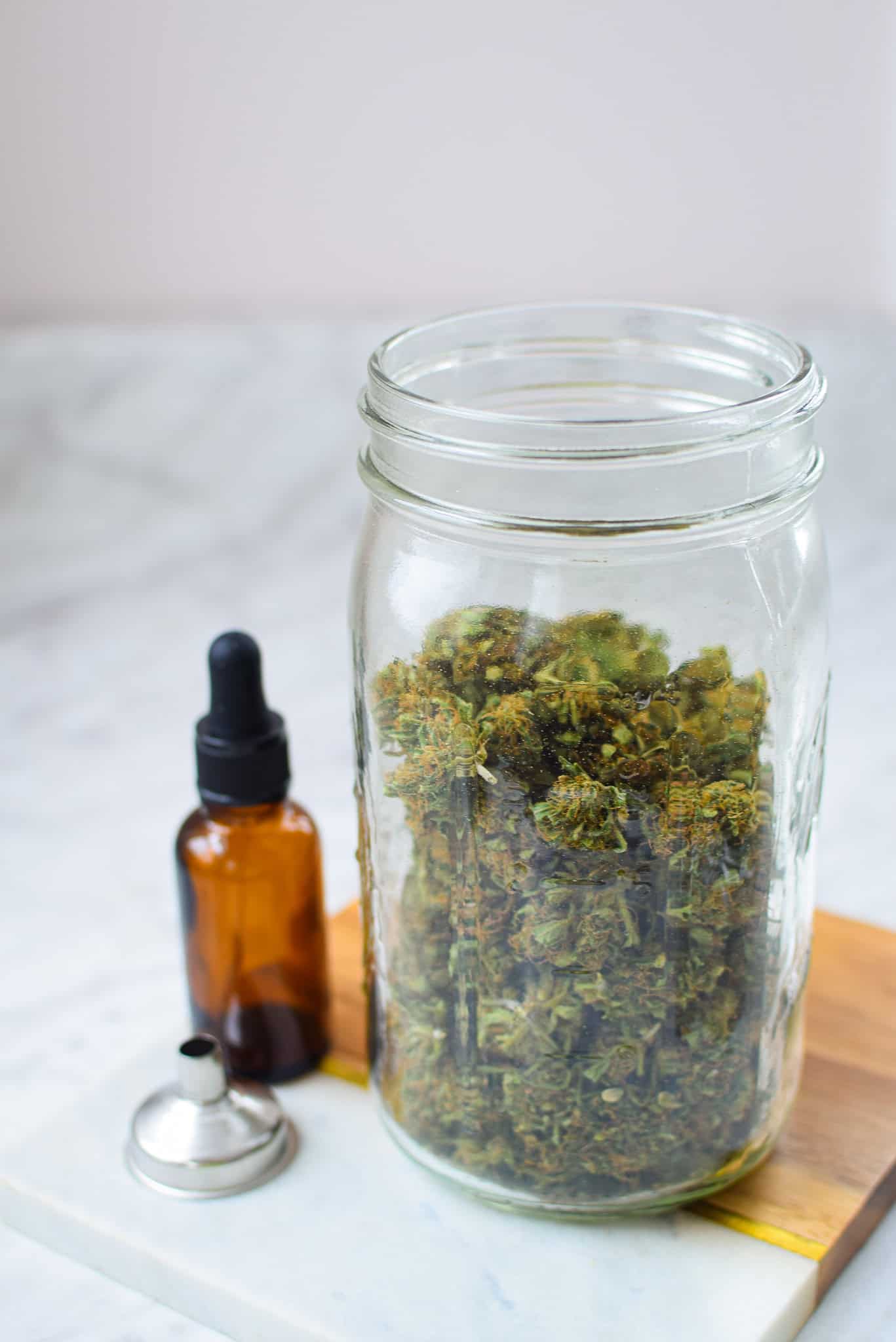 A picture of cannabis stored in a mason jar. 