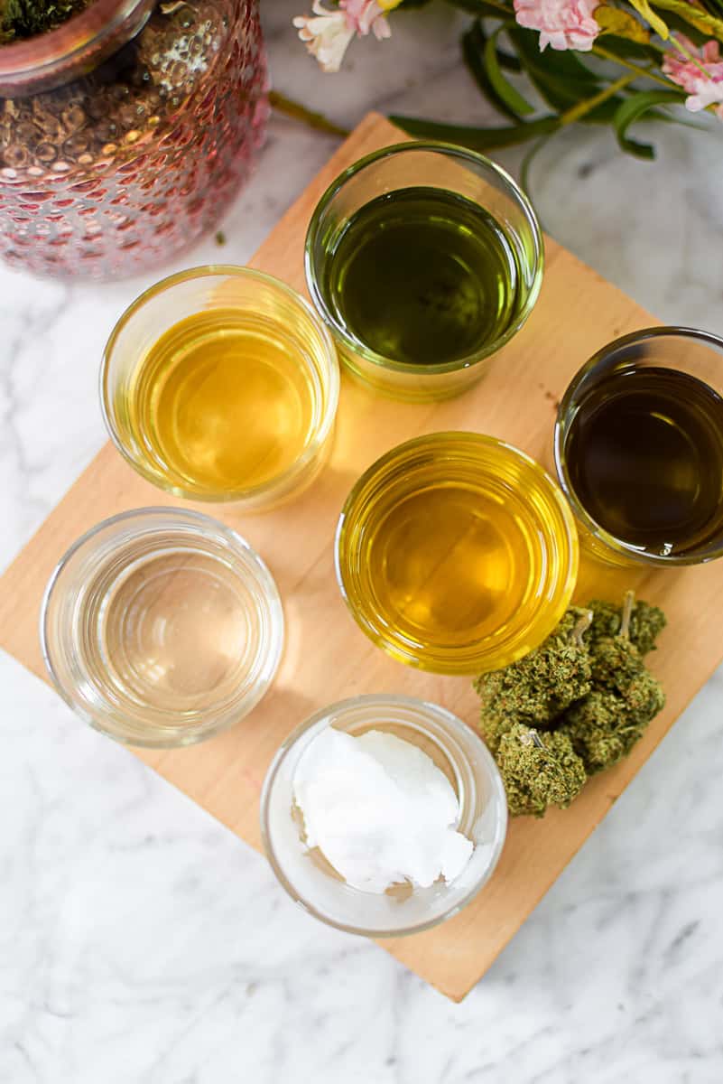 A picture of several different types o cannabis oil.