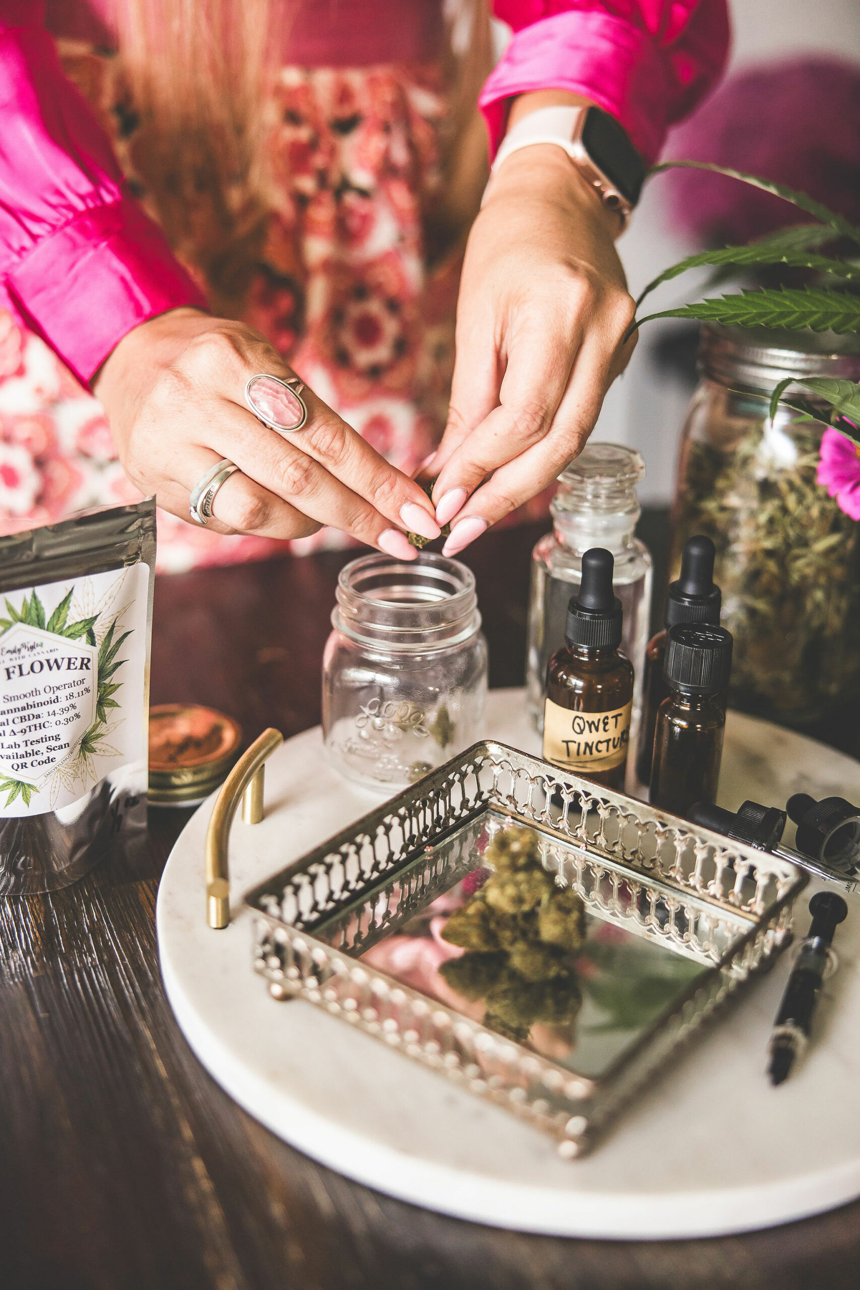 A picture of Emily Kyle making a cannabis tincture.