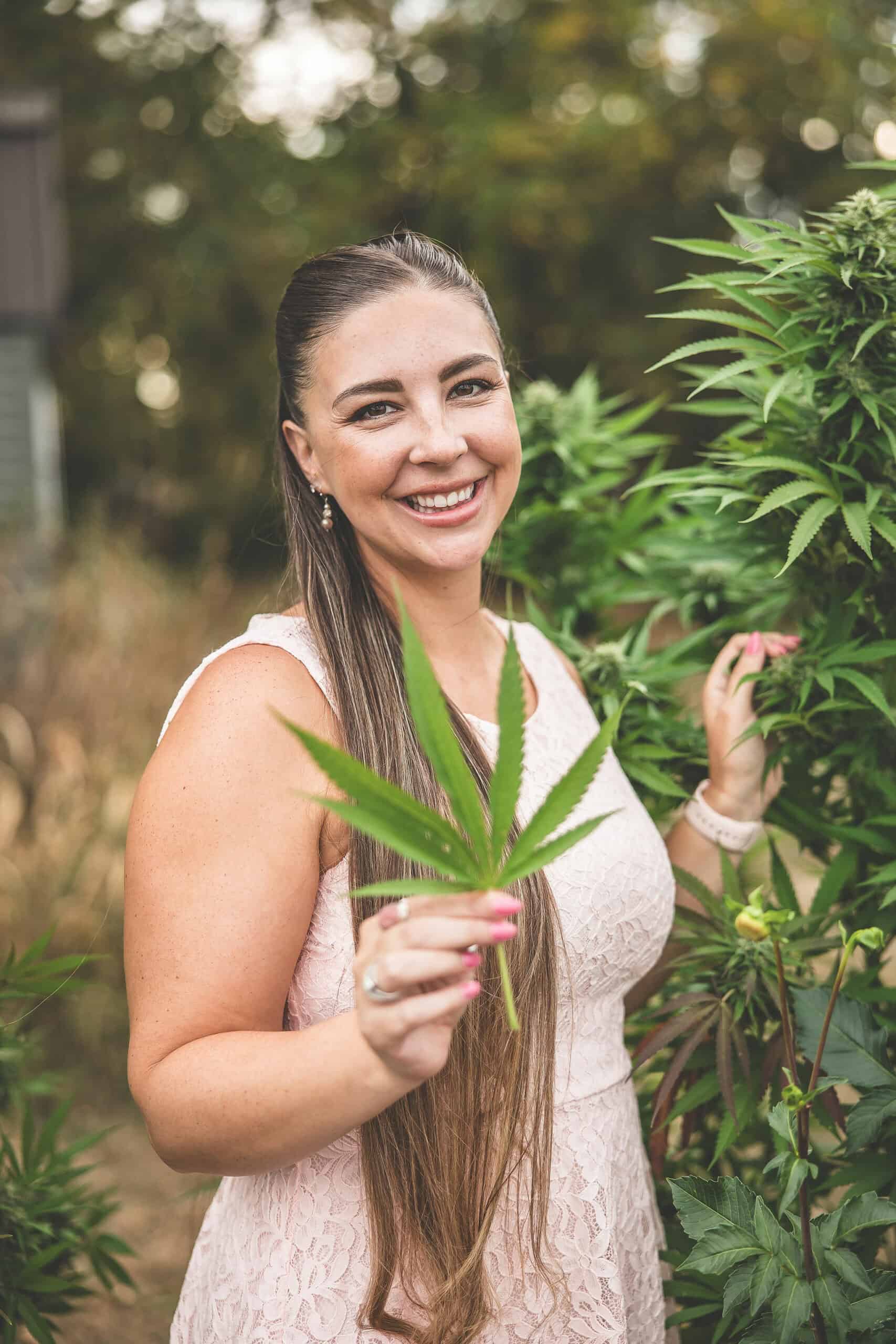Cannabis plants with Emily Kyle outdoors, promoting medical marijuana, CBD, and cannabis education.
